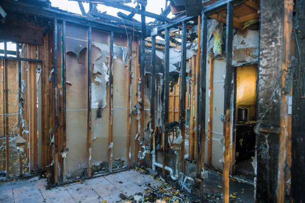 Professional Fire Damage Restoration technician working in Gamerco, NM